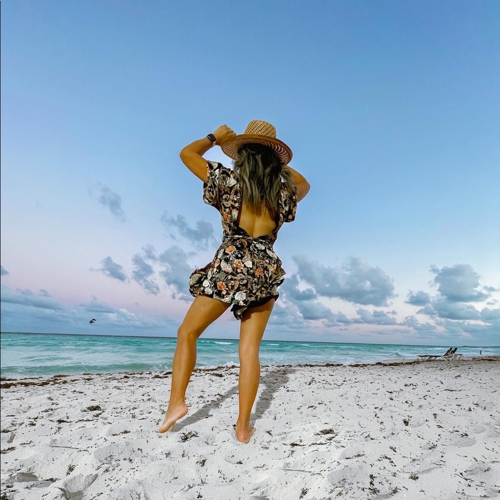 festival style | satin tie romper with an adjustable waist tie closure.